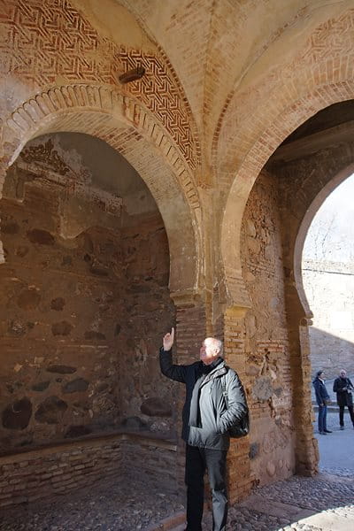 This pattern of equilateral triagles, found in the Alhambra’s Puerta del Vino, lower right, became in 1942 a building block for a print Escher captioned “triangle system. 2 motifs, symmetrical, II A2 type 1*” in a process shown above prepared by Pérez-Gómez.